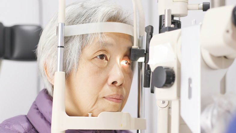 Diabetic patient having her eyes examined